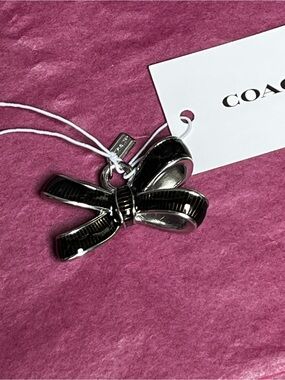 Coach NWT Bow Charm w/ dustbag & choice of chain